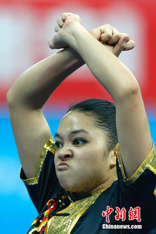 Expresiones faciales de atletas durante los Juegos Asiáticos 2014 en Incheon.