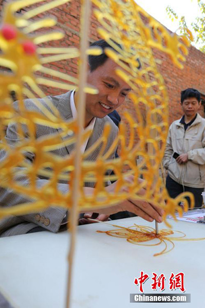 Liu Shengli, el pintor que dibuja con azúcar.