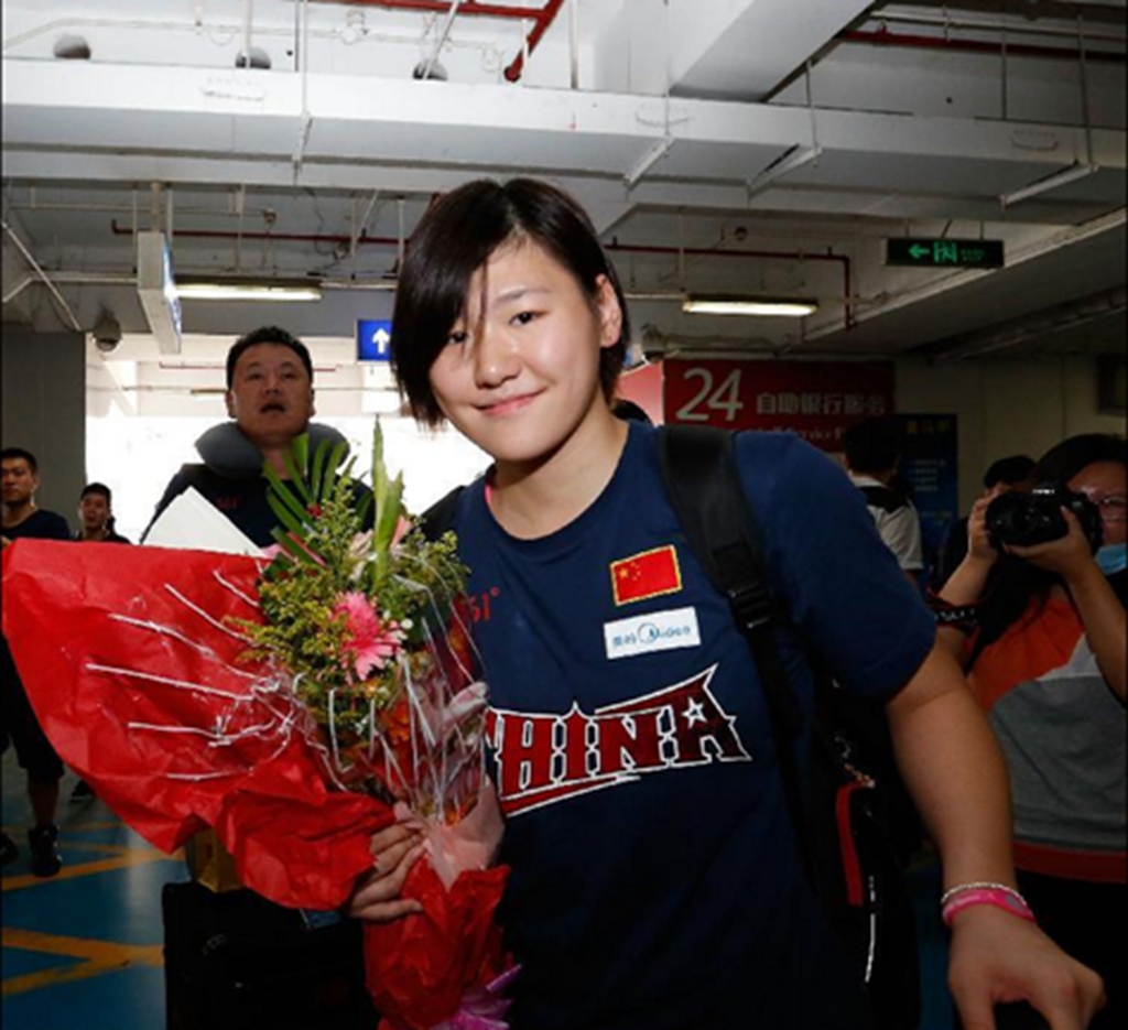 El equipo de natación de China regresa a Beijing