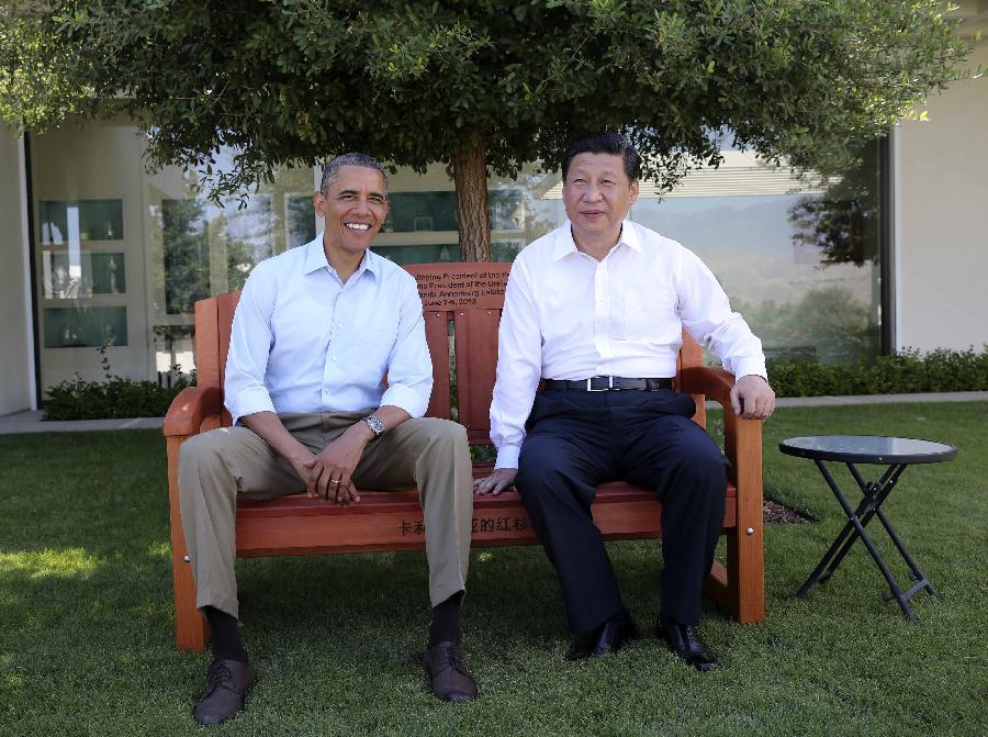 El presidente chino Xi Jinping (izquierda) y el presidente de Estados Unidos Barack Obama pasean antes de su segunda reunión, en el retiro de Annenberg, California, el 8 de junio de 2013. Xi Jinping se reunió con Barack Obama en una cumbre informal en Sunnylands, California, el 7 y 8 de junio de 2013. Este mes, Xi realizará su primera visita de Estado a Estados Unidos desde que asumiera el cargo de presidente en2013.