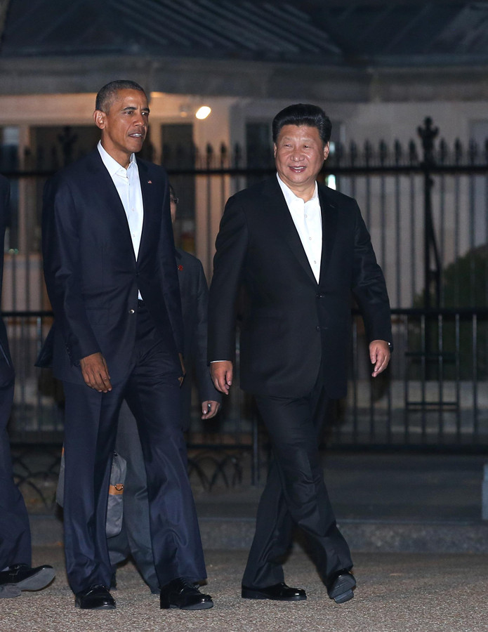 Xi Jinping y Obama pasean juntos antes de cenar