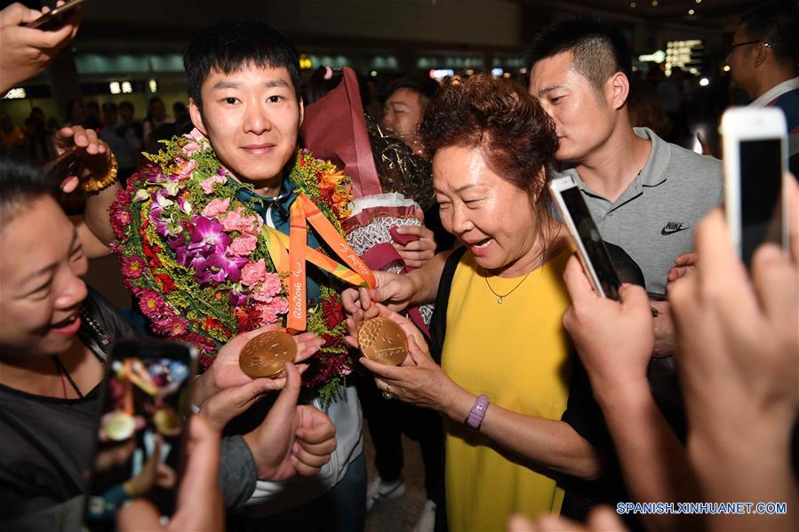 Medallas de oro chinas en Paralímpicos, reflejo de victorias de discapacitados en el país