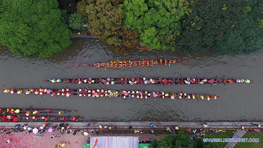 Actividad de botes de dragón, en Guangzhou