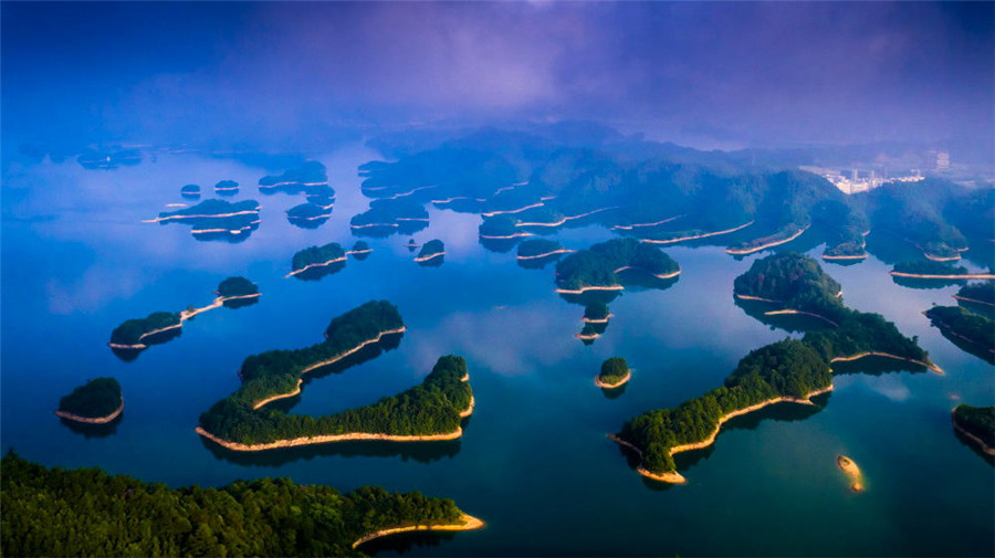 Hermoso lago de las mil islas, tomada por Xia Lixin. [Foto proporcionada por photoint.net]